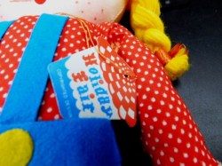2 cloth dolls label